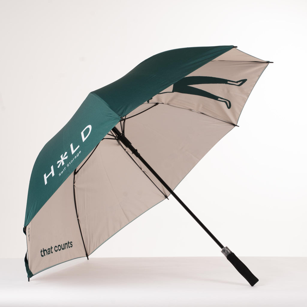 HOLD branded green umbrella